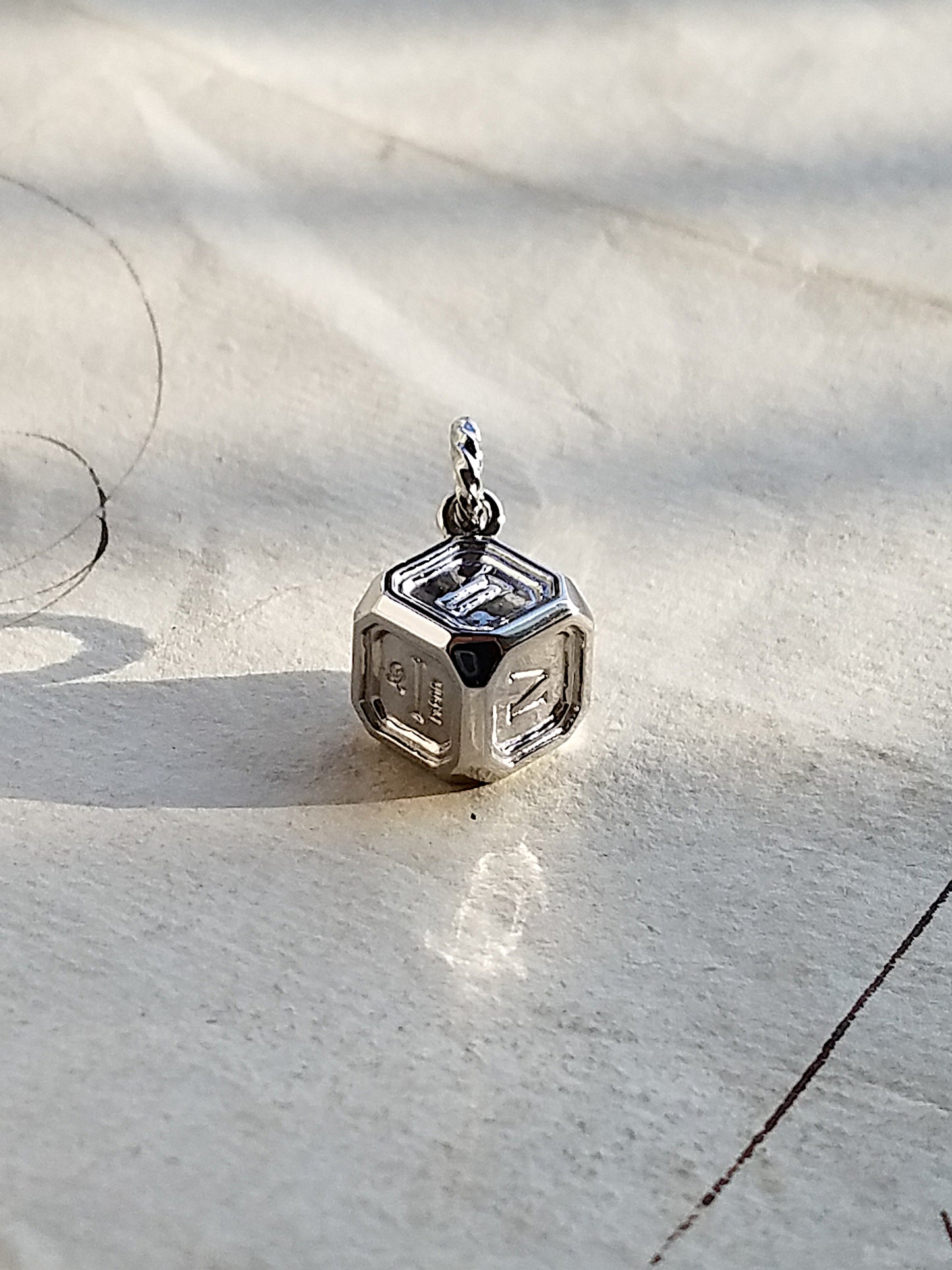 QSO126 Roman dice Pendant Pt900 Custom