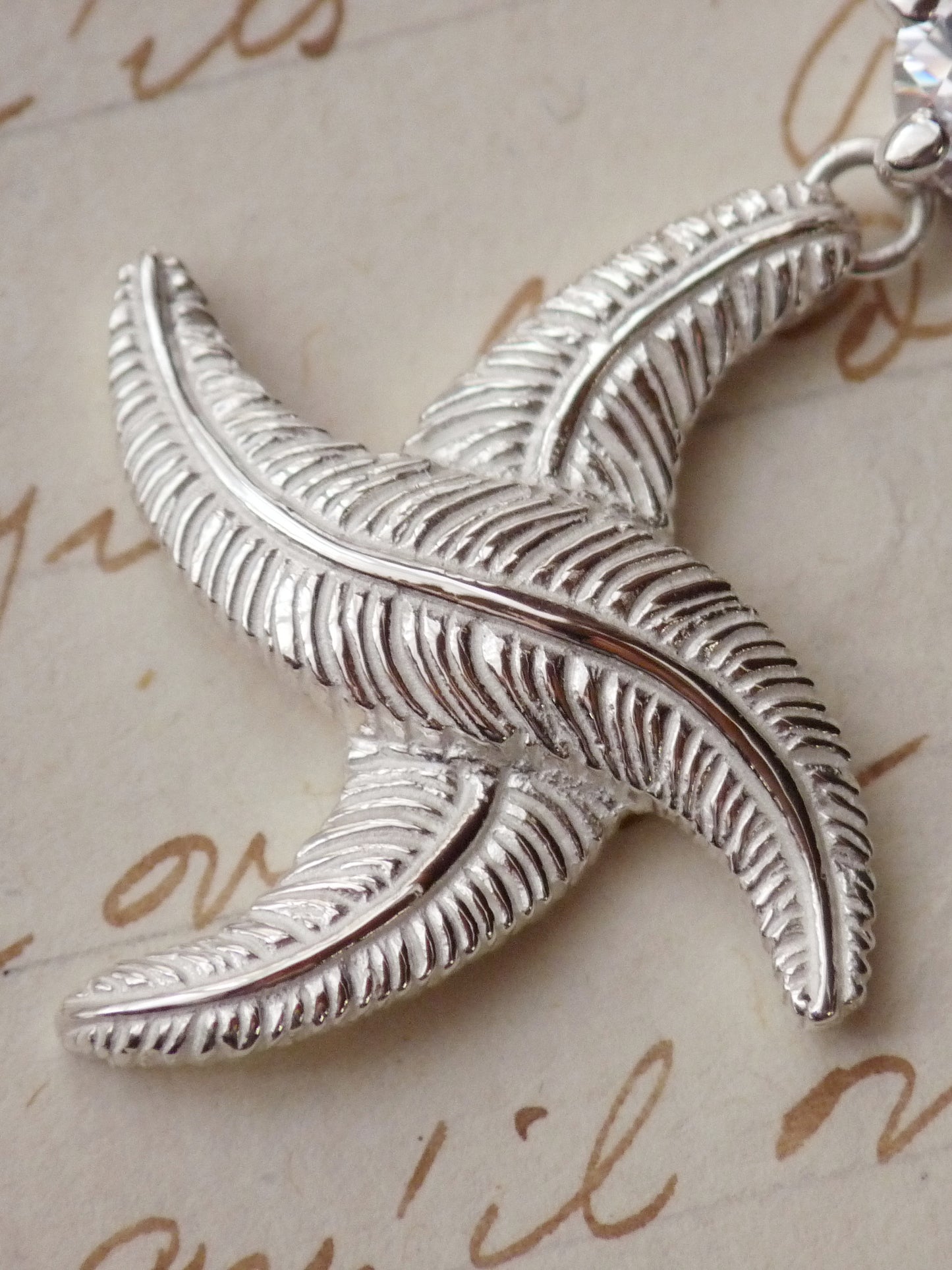 QFO016 Cross Feather Pendant